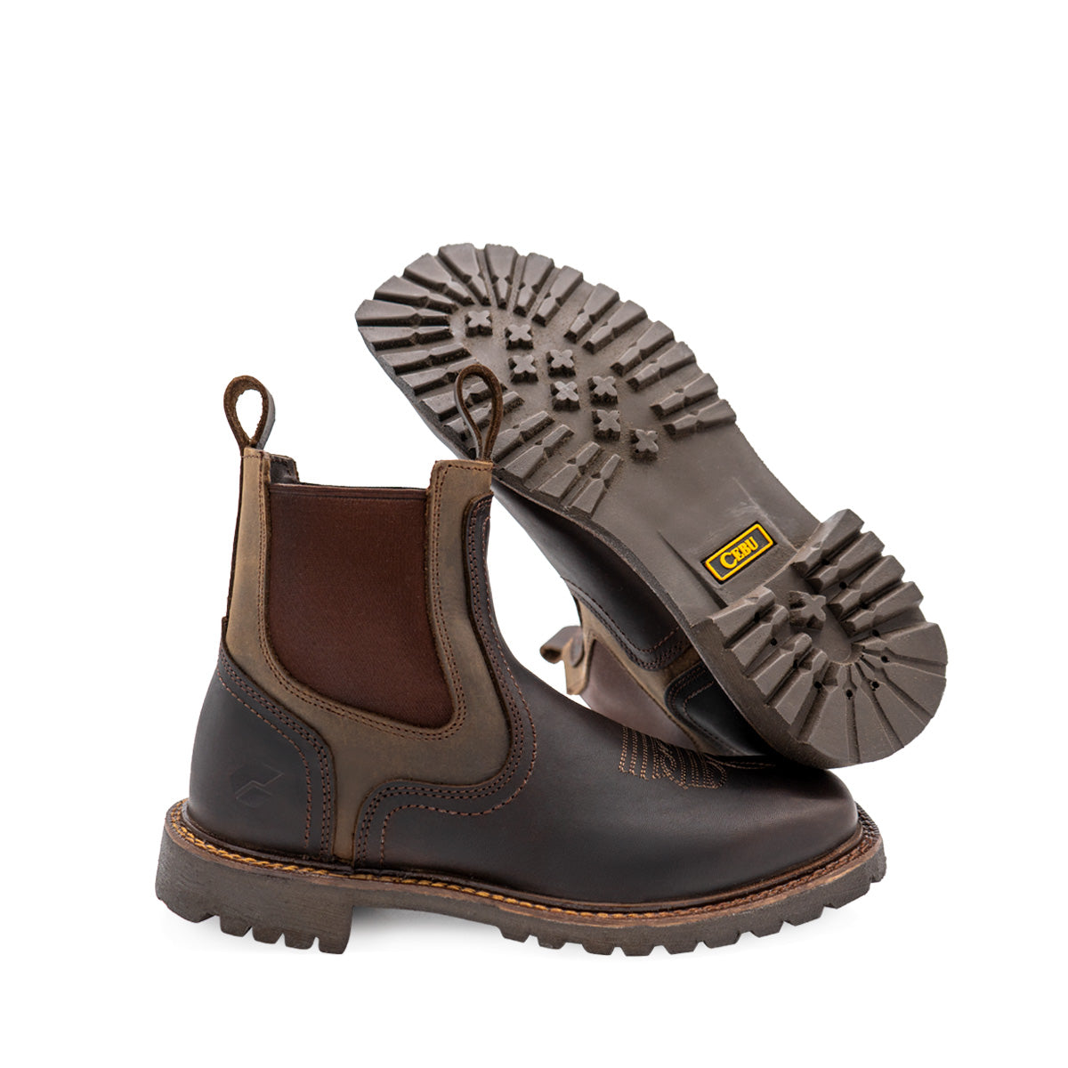 BC Track Mens Chelsea Boot Steel Toe shown in rich brown leather with elastic side panels and rugged track sole pattern. Features durable construction, protective steel toe, and chunky treaded outsole for enhanced grip and durability. Side view displaying classic pull-on Chelsea boot design.