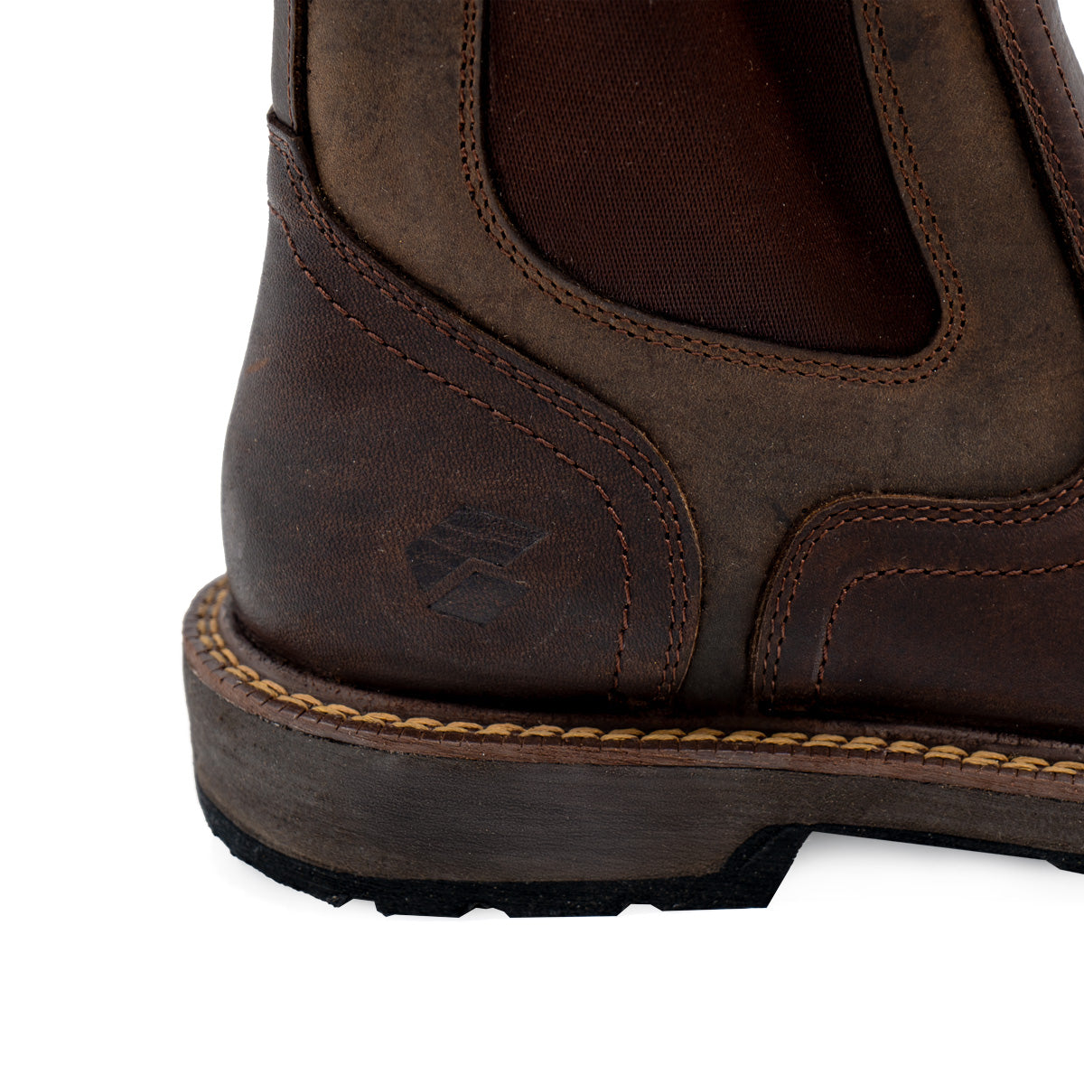 BC Ultra Chelsea Boot close-up detail showing rich brown leather construction, contrast stitching, and durable wooden sole with sleek elastic side panel, highlighting premium craftsmanship and lightweight design for work comfort